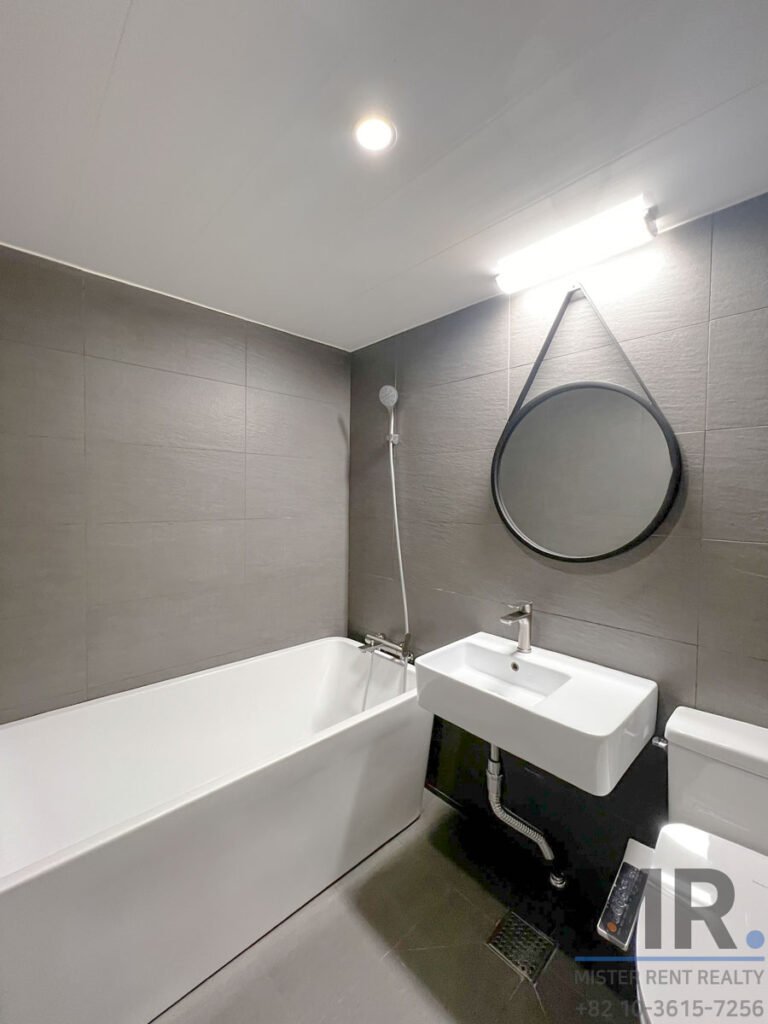 Modern bathroom with bathtub and sink
