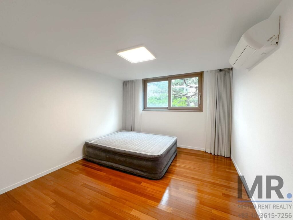 Bright room with wooden flooring